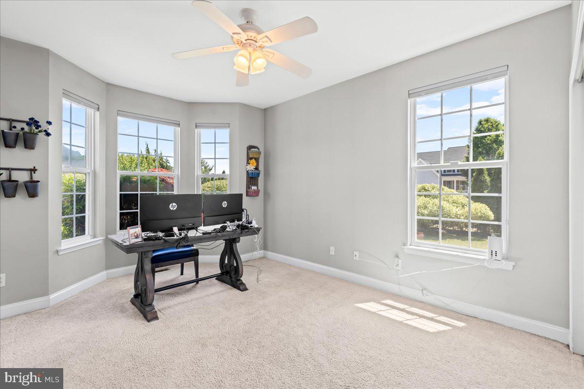 2650 Valhalla Road Vineland, NJ 08361 - Photo 9 of 49 a view of a workspace with furniture and a window