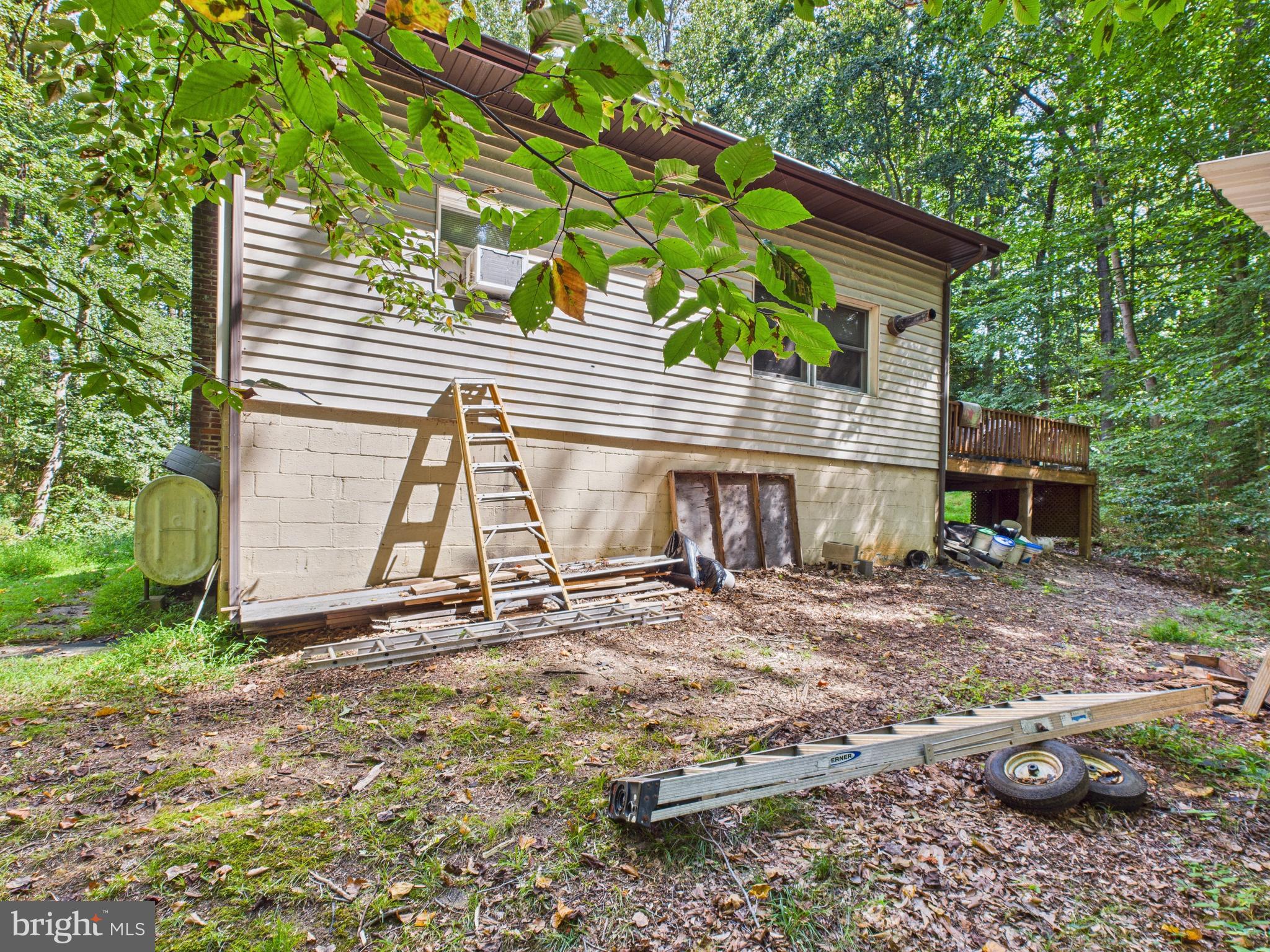 7709 Brooklyn Bridge Road Laurel, MD 20707 - Photo 14 of 23 a view of a house with backyard