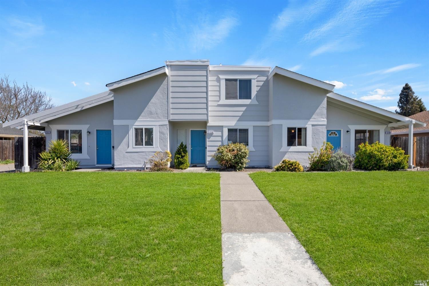 1232 Southwest Boulevard Rohnert Park, CA 94928 - Photo 1 of 1 a front view of a house with a yard