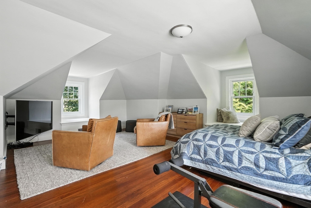 15 Winthrop Road Lexington, MA 02421 - Photo 34 of 39 a bedroom with two beds and a couch