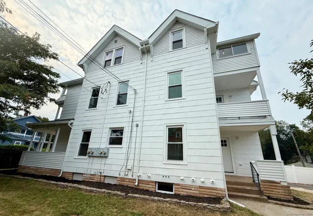 a front view of a house with a balcony