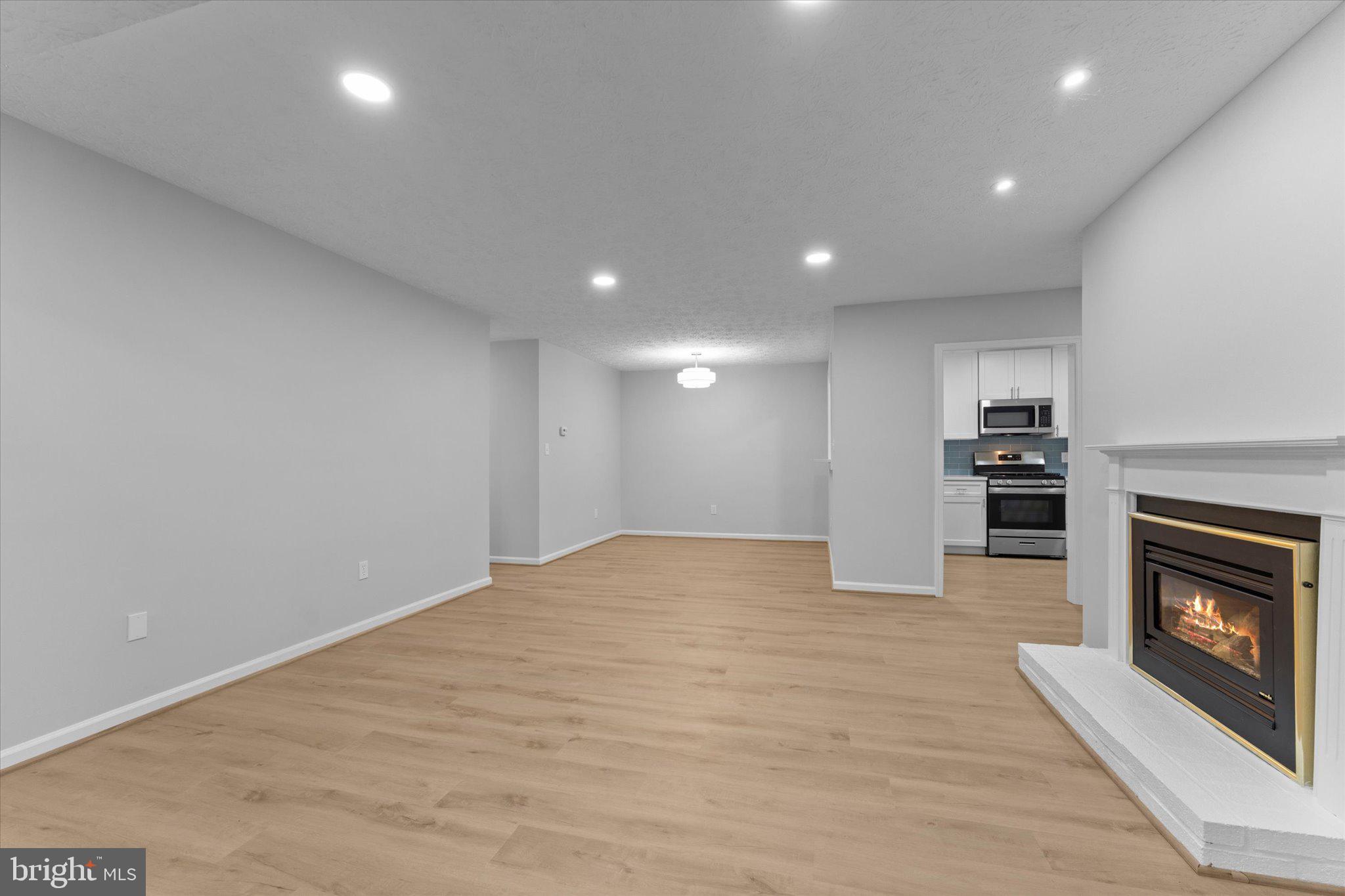 2245 Hunter's Run Drive Reston, VA 20191 - Photo 11 of 47 Living & Dining Room
