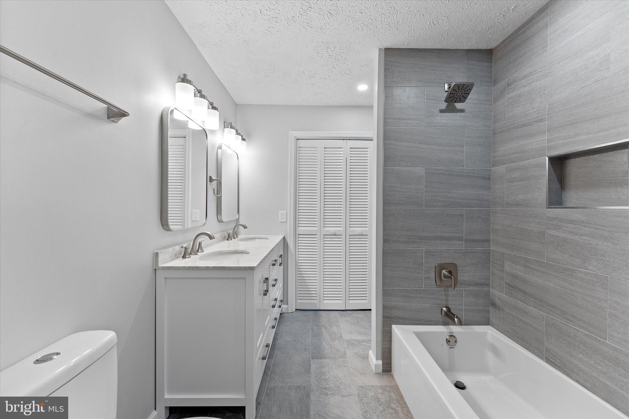 2245 Hunter's Run Drive Reston, VA 20191 - Photo 5 of 47 All New Tub/Shower with Tile Surround