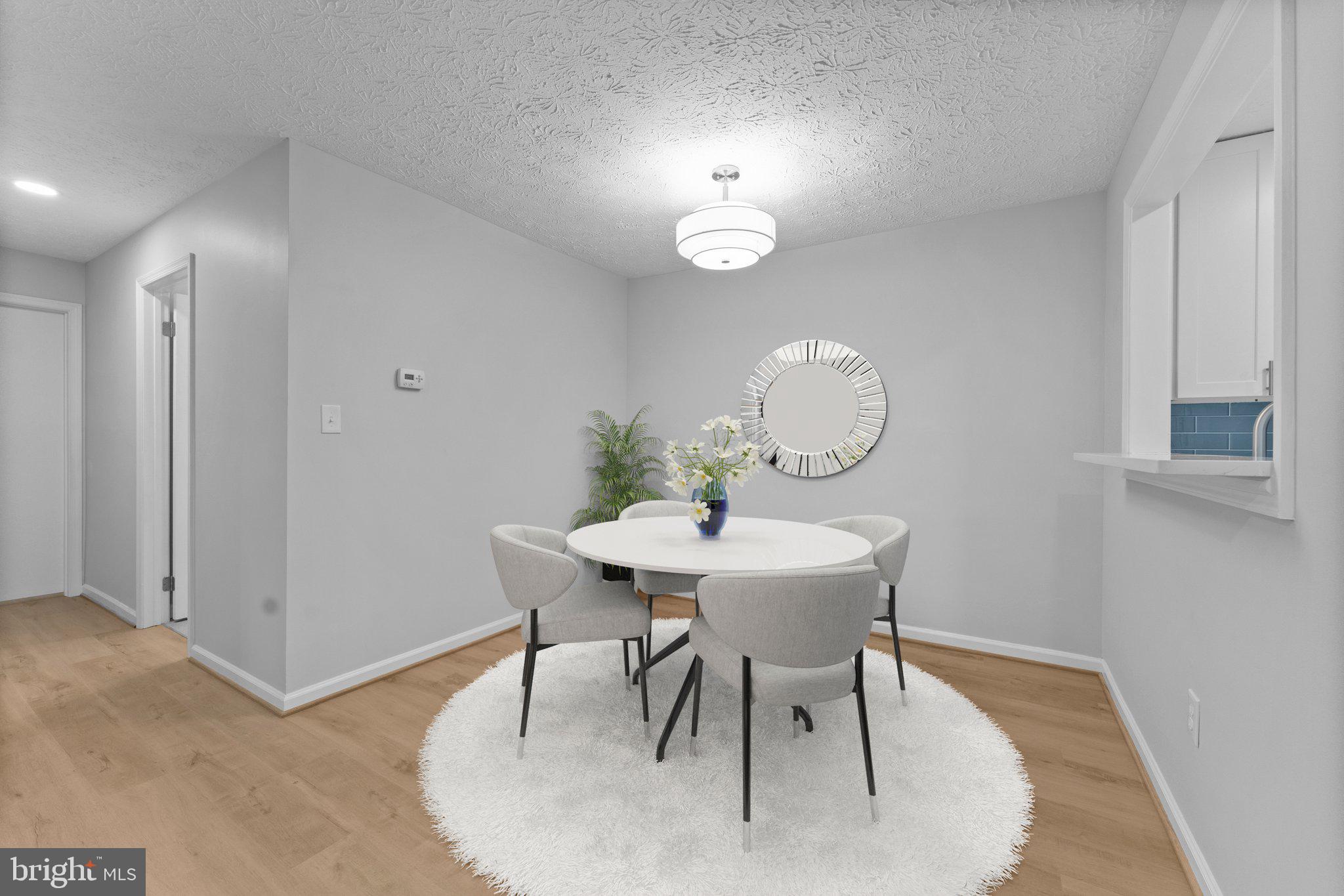 2245 Hunter's Run Drive Reston, VA 20191 - Photo 8 of 47 Staged Dining Room
