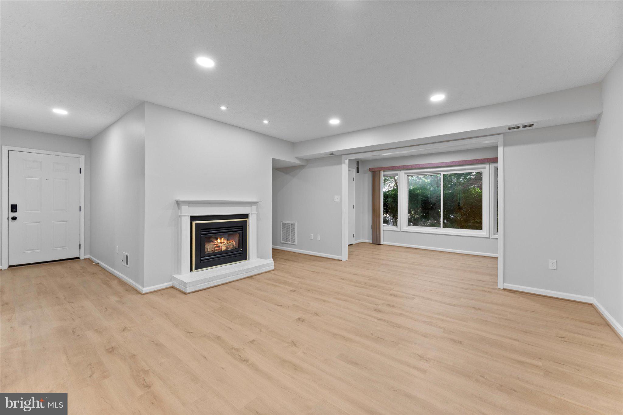 2245 Hunter's Run Drive Reston, VA 20191 - Photo 9 of 47 Living Room looking at Sunroom