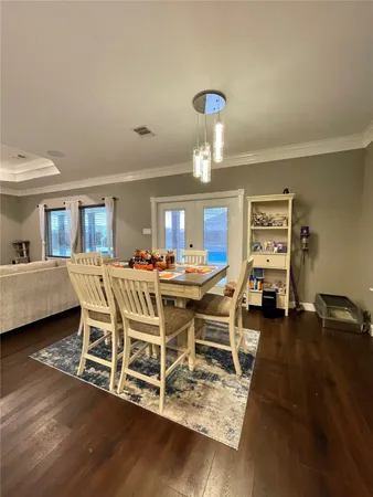 a kitchen with stainless steel appliances granite countertop a refrigerator and a stove