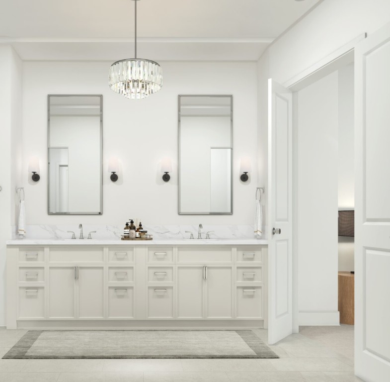 5327 Lambeth Riverside Drive Houston, TX 77091 - Photo 11 of 18 Spa-inspired primary bath with a double-sink vanity, expansive mirrors, and elegant lighting. Bright, clean finishes and generous storage create a functional, serene space to start and end your day.
