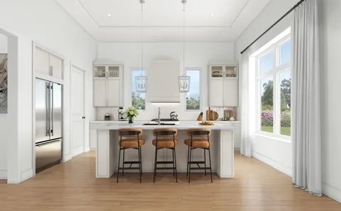 front view of a house with a tree