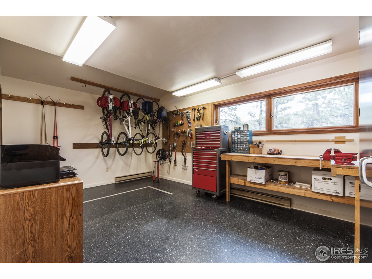 229 Kelly Road East Boulder, CO 80302 - Photo 22 of 25 a view of a garage with furniture