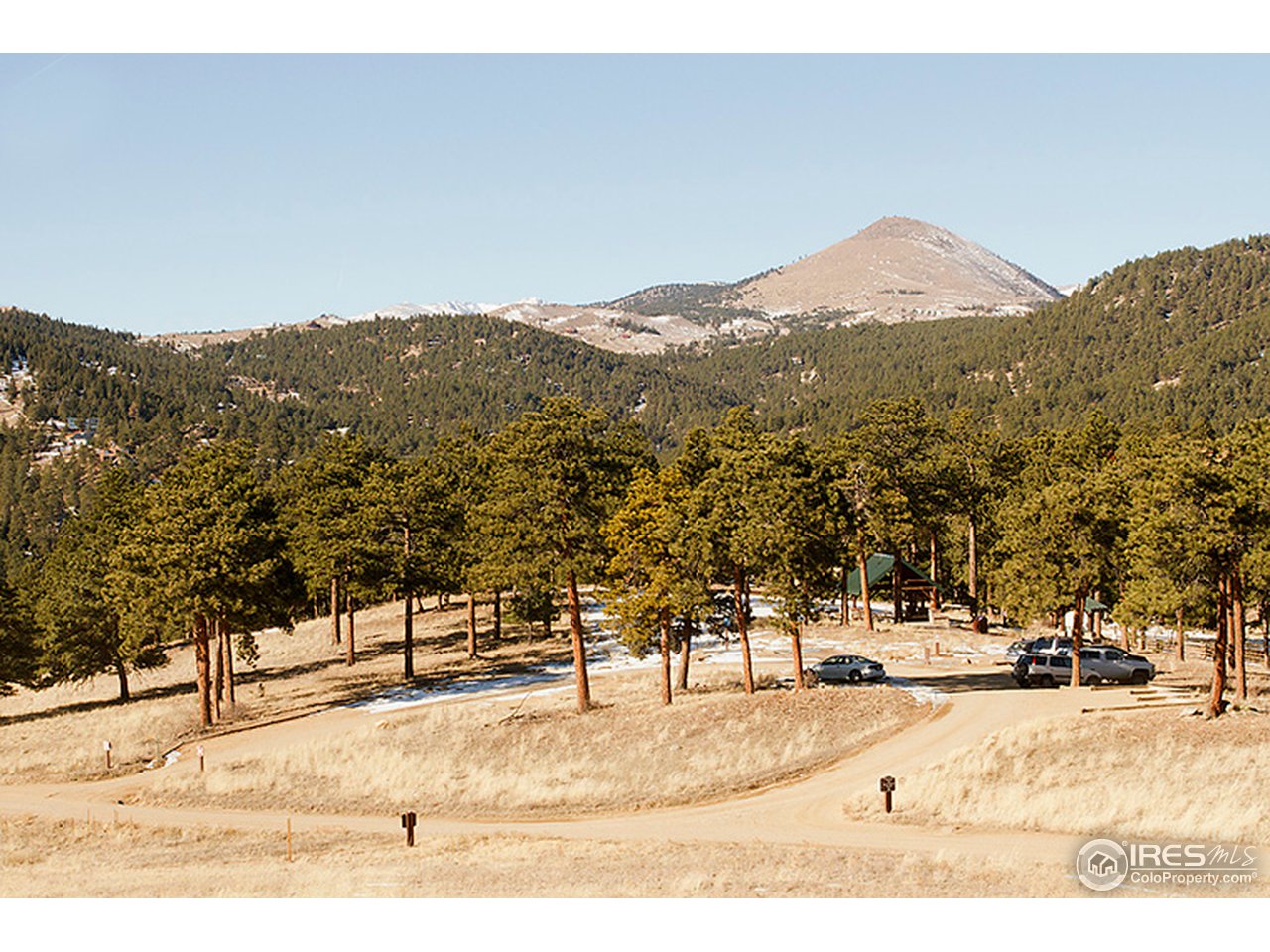 229 Kelly Road East Boulder, CO 80302 - Photo 23 of 25 a view of a town with mountains