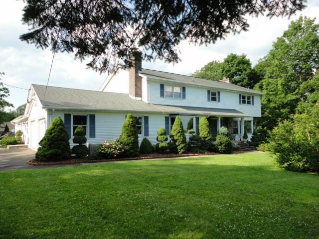 50 Old Farm Road New Fairfield, CT 06812 - Photo 1 of 1 a front view of a house with a yard and porch