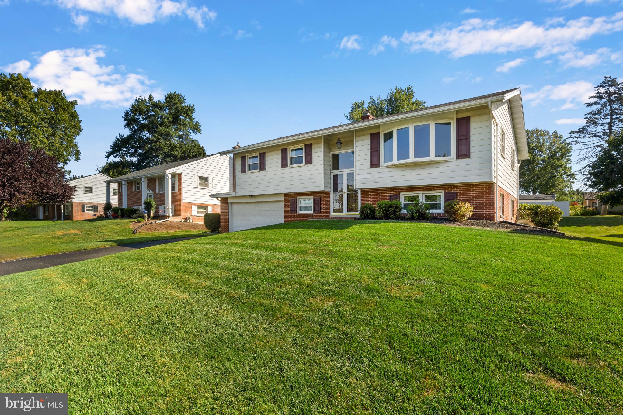 1059 Nissley Road Lancaster, PA 17601 - Photo 3 of 29 Charming split-level home on lush green lawn.