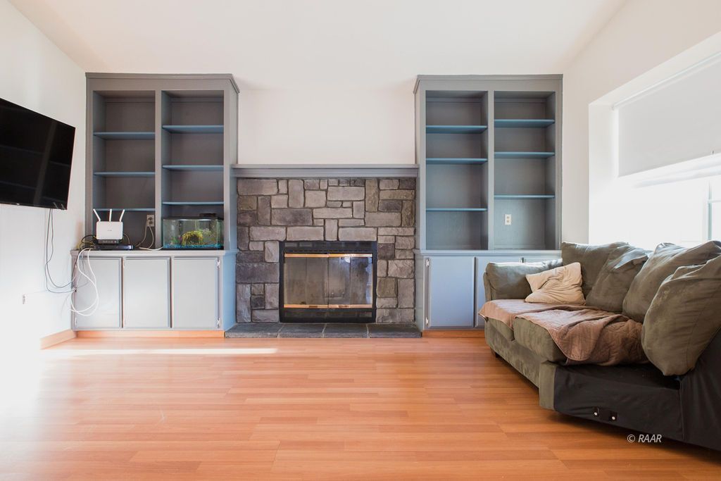 620 Heather Court Ridgecrest, CA 93555 - Photo 7 of 26 a living room with furniture and a fireplace