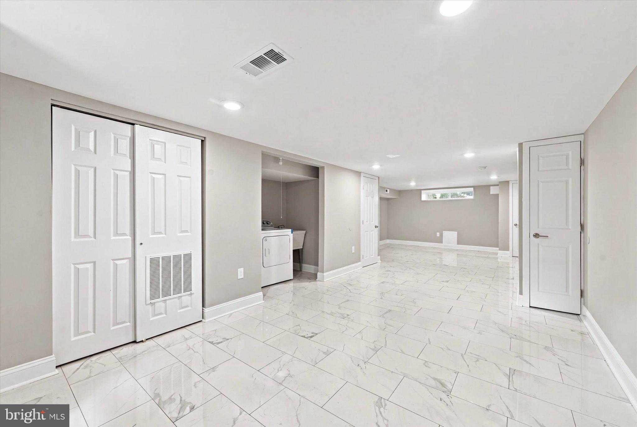 204 East Marshall Road Lansdowne, PA 19050 - Photo 12 of 25 Finished basement with laundry and powder room