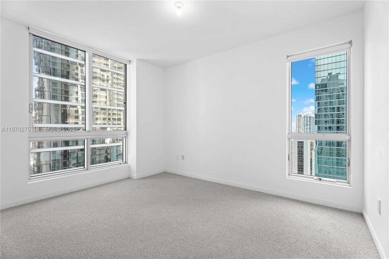 300 South Biscayne Boulevard, Unit T2602 Miami, FL 33131 - Photo 7 of 17 an empty room with a window