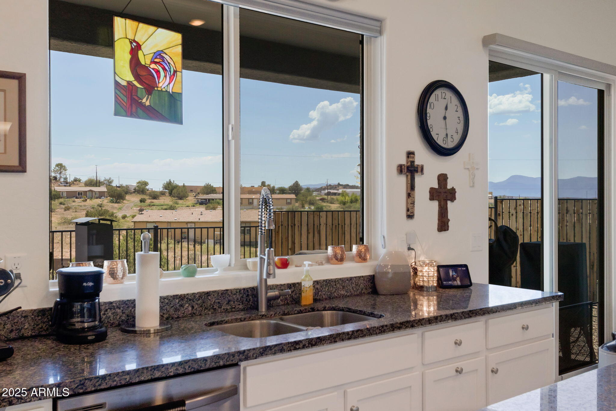6025 North Hanover Court Rimrock, AZ 86335 - Photo 12 of 30 a bathroom with a double vanity sink and a mirror