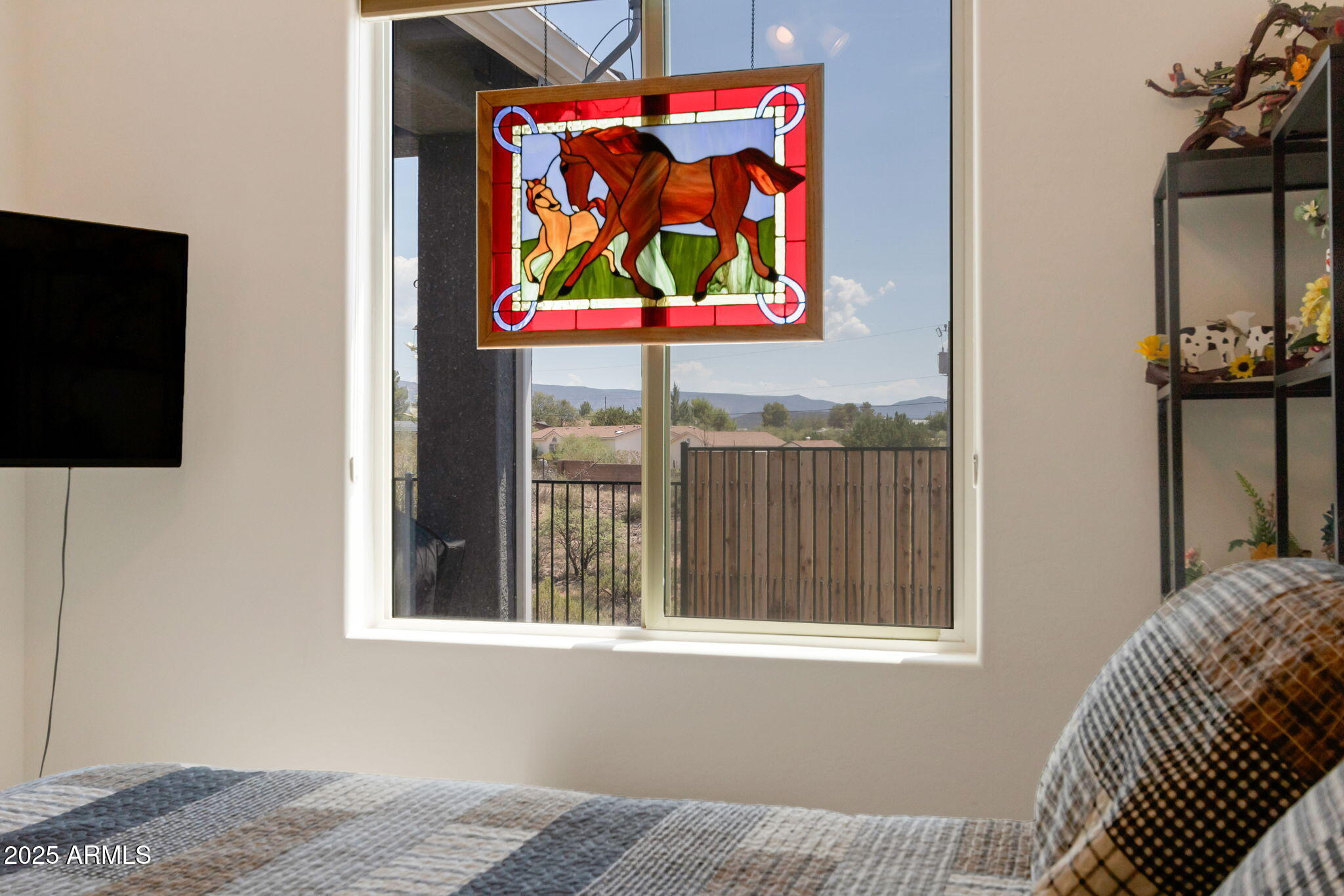 6025 North Hanover Court Rimrock, AZ 86335 - Photo 17 of 30 a bed room with furniture and flat screen tv