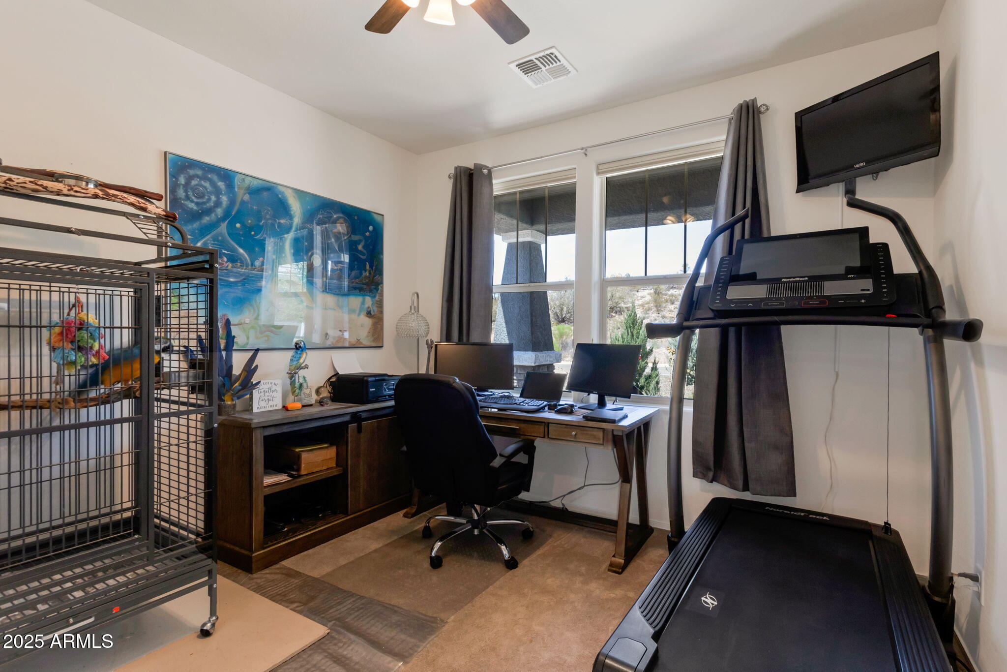 6025 North Hanover Court Rimrock, AZ 86335 - Photo 18 of 30 a view of a workspace with furniture and a window