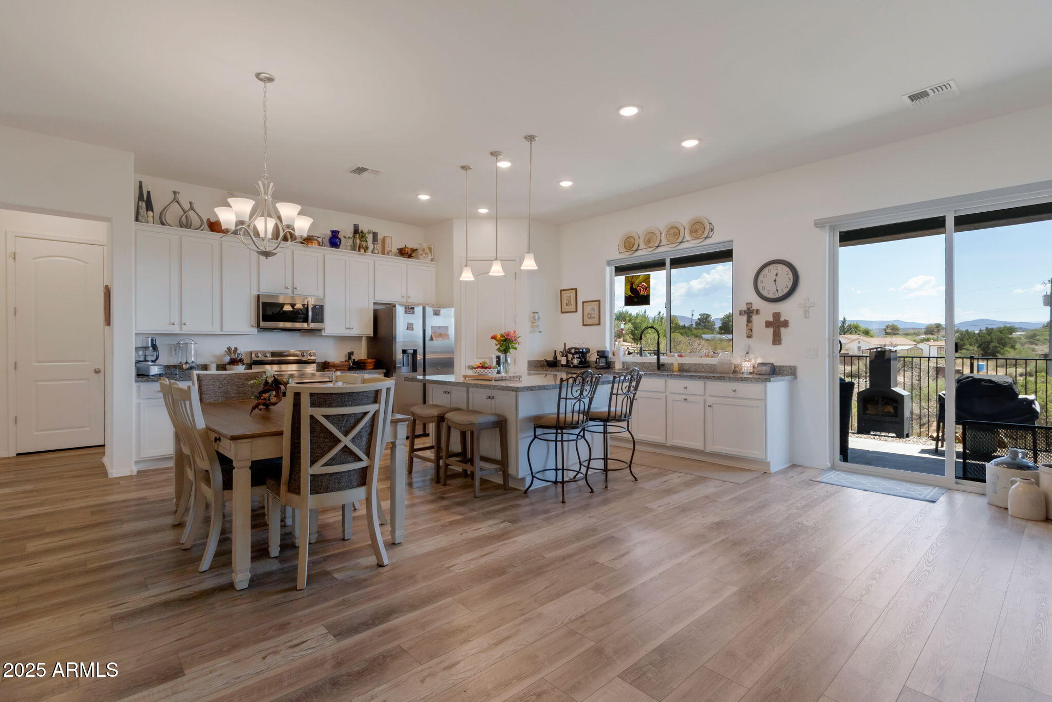 6025 North Hanover Court Rimrock, AZ 86335 - Photo 8 of 30 a view of a dining room with furniture and wooden floor