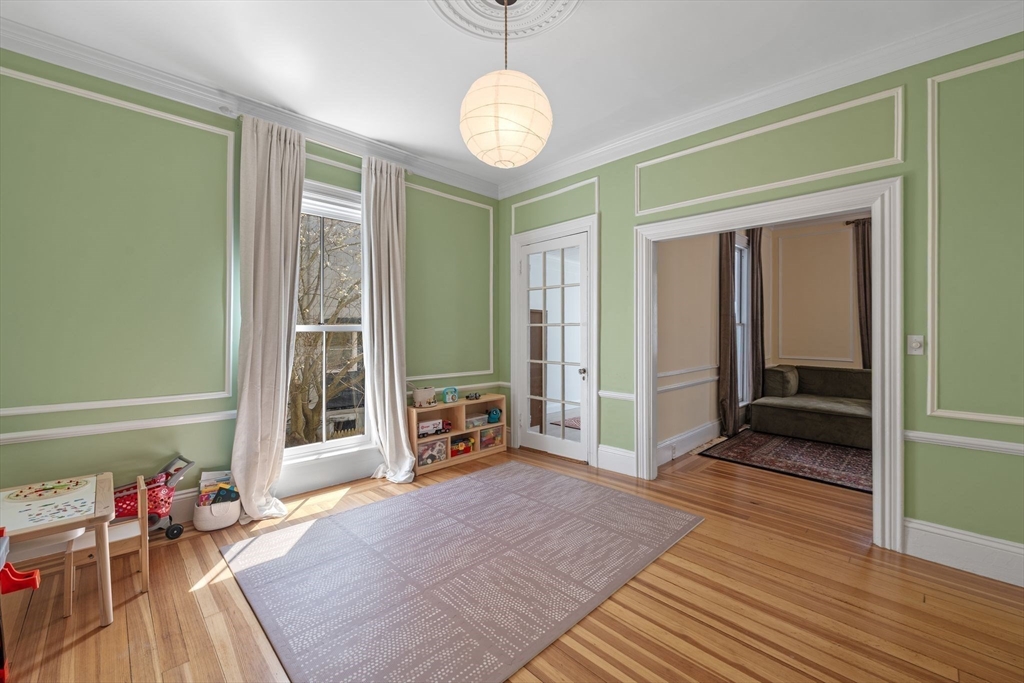 90 Puritan Road Swampscott, MA 01907 - Photo 19 of 42 a view of a livingroom with wooden floor and furniture