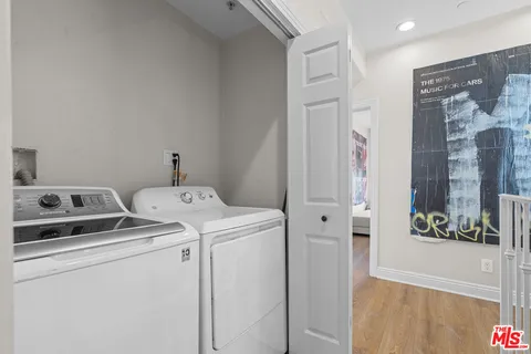 a utility room with dryer and washer
