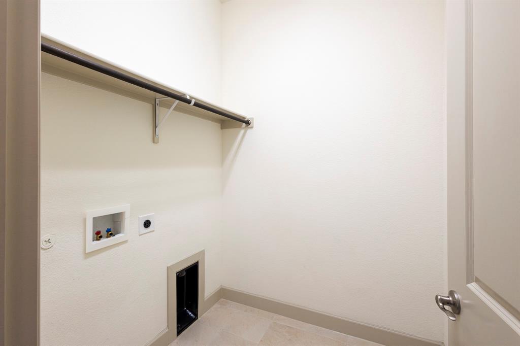6337 Saddlebrook Way Irving, TX 75039 - Photo 18 of 40 a view of utility room