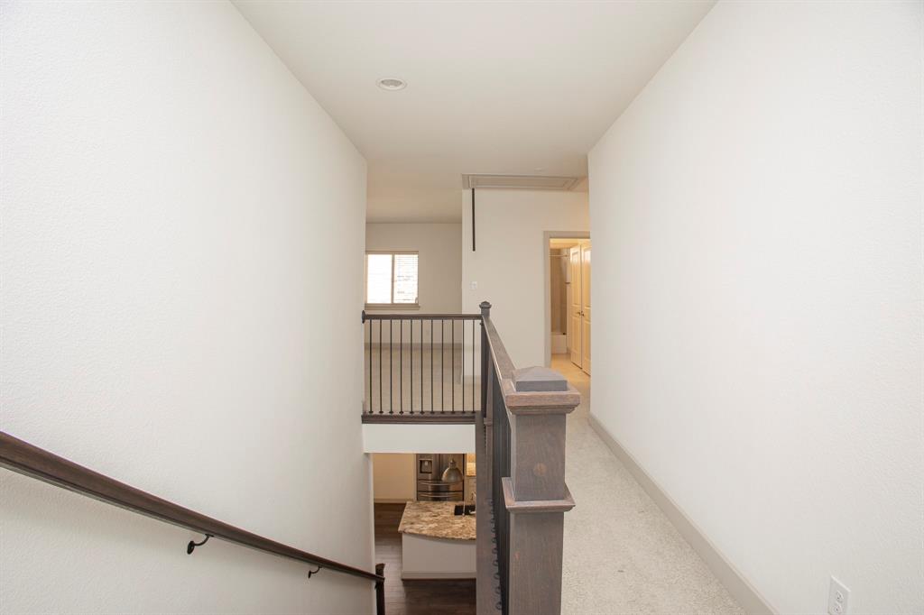 6337 Saddlebrook Way Irving, TX 75039 - Photo 27 of 40 a view of an entryway with staircase