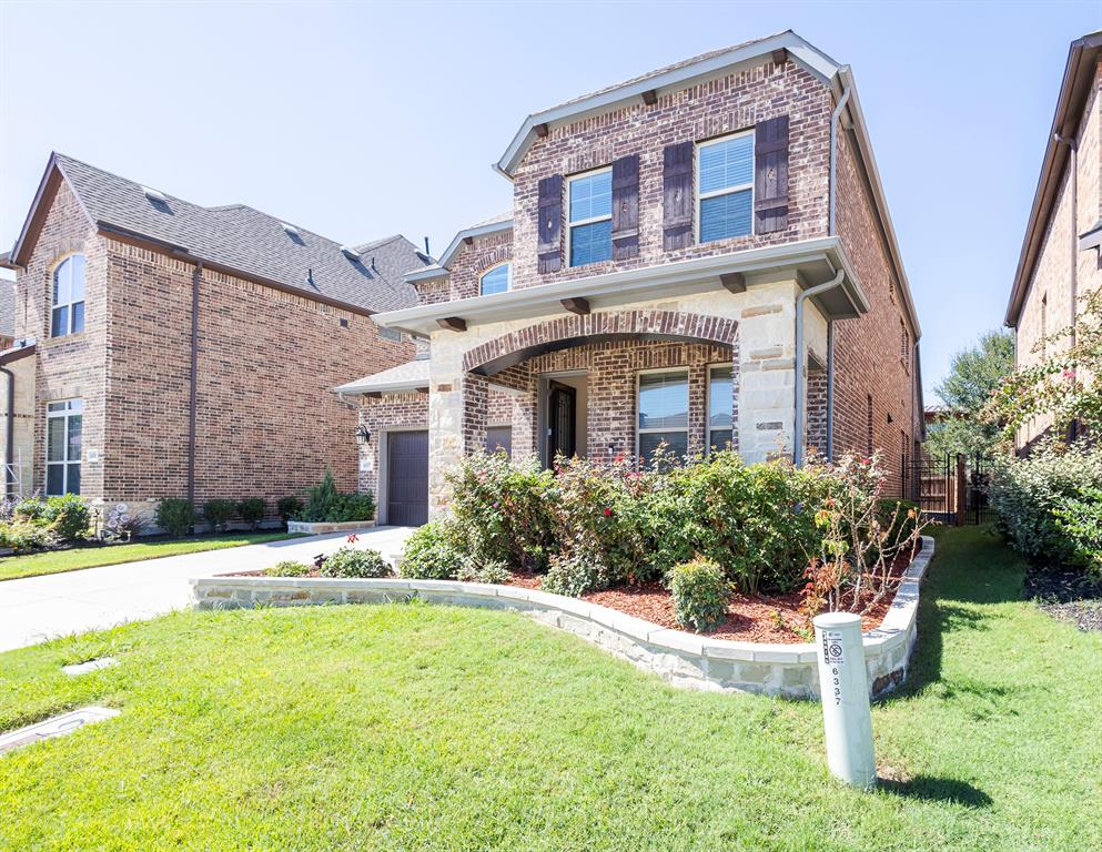 6337 Saddlebrook Way Irving, TX 75039 - Photo 3 of 40 a front view of a building with garden