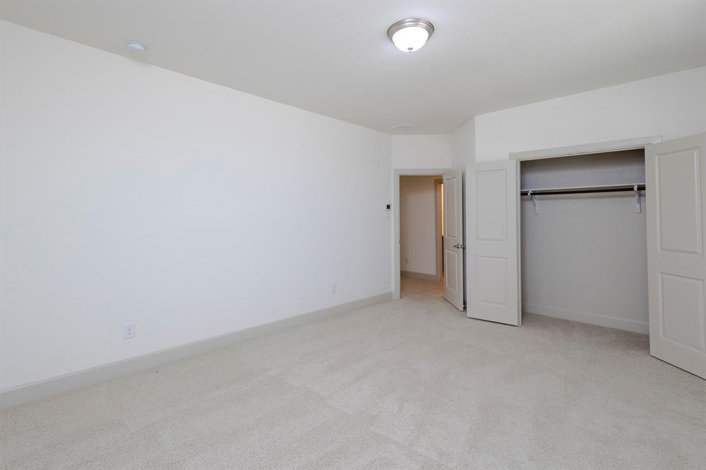 6337 Saddlebrook Way Irving, TX 75039 - Photo 31 of 40 an empty room with closet area