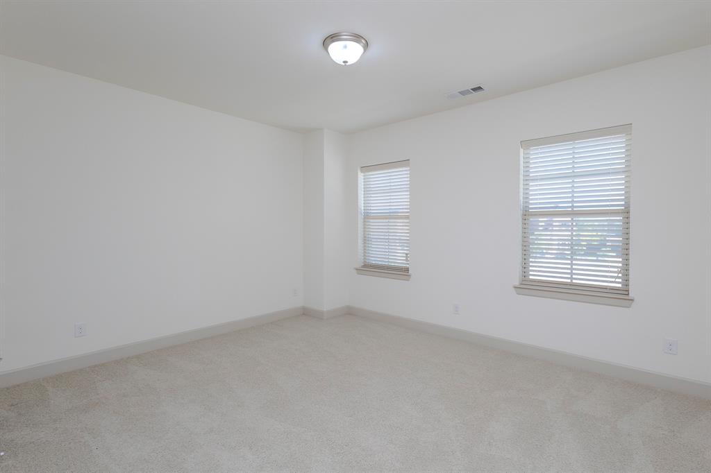 6337 Saddlebrook Way Irving, TX 75039 - Photo 32 of 40 an empty room with windows