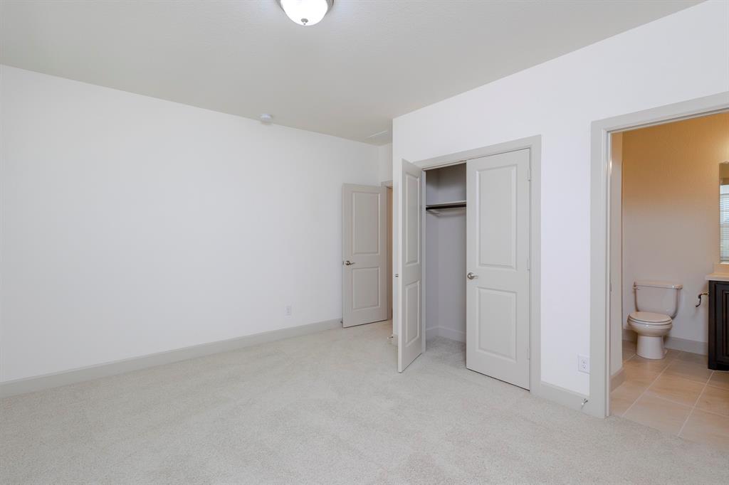 6337 Saddlebrook Way Irving, TX 75039 - Photo 33 of 40 a view of an empty room and a bathroom