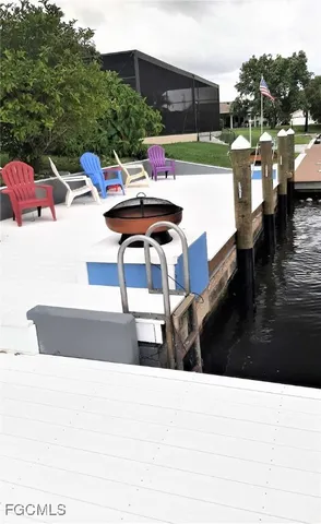 a terrace with outdoor seating and city view