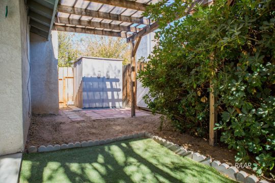 809 Charles Court Ridgecrest, CA 93555 - Photo 31 of 33 a view of a house with a yard