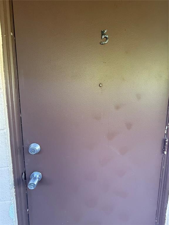 800 North Hastings Street, Unit 5 Orlando, FL 32808 - Photo 11 of 11 a bathroom with a shower