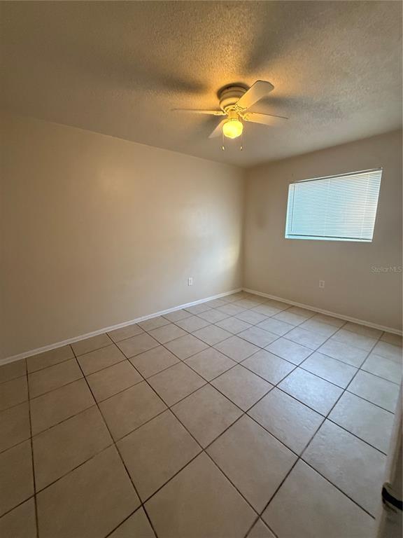 800 North Hastings Street, Unit 5 Orlando, FL 32808 - Photo 5 of 11 a view of an empty room