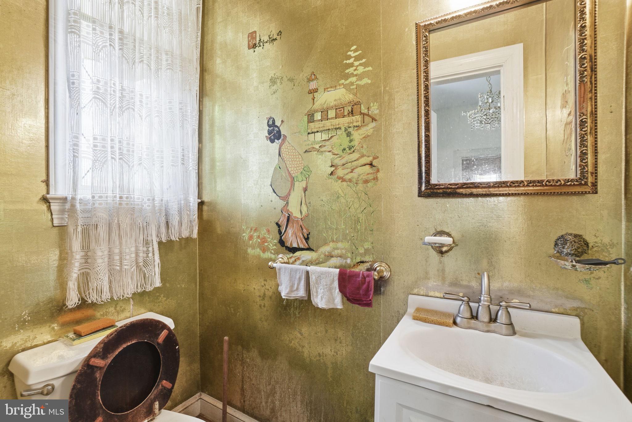 1430 Foxhall Road Northwest Washington, DC 20007 - Photo 13 of 53 a bathroom with a sink a toilet and shower curtain