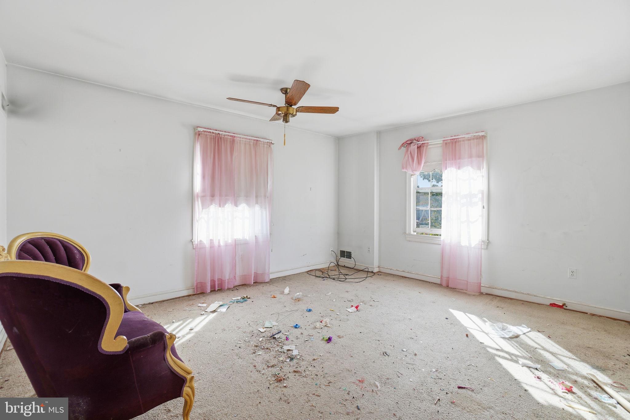 1430 Foxhall Road Northwest Washington, DC 20007 - Photo 19 of 53 a view of a livingroom with a staircase
