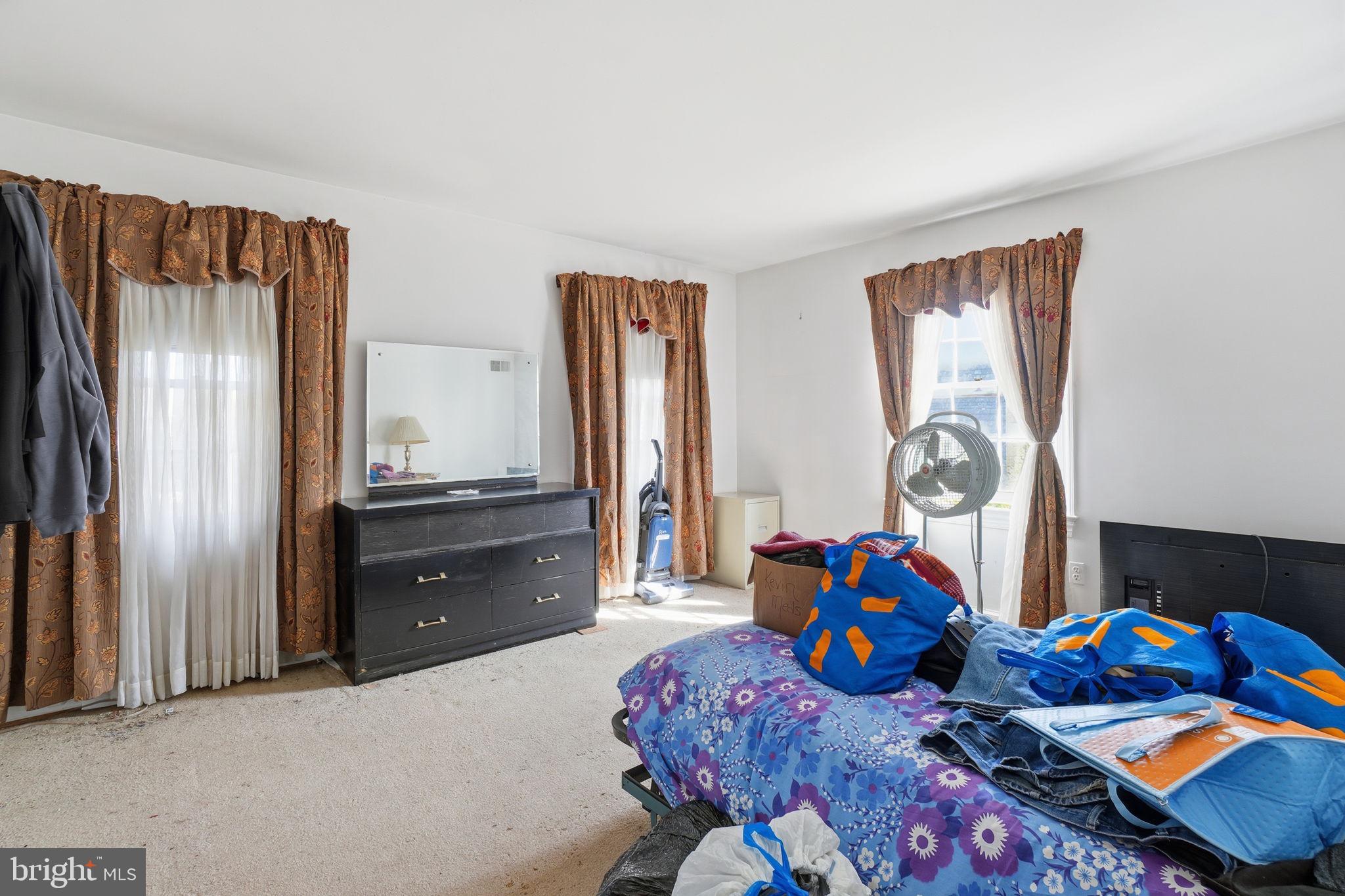 1430 Foxhall Road Northwest Washington, DC 20007 - Photo 22 of 53 a bed room with furniture and a baby crib