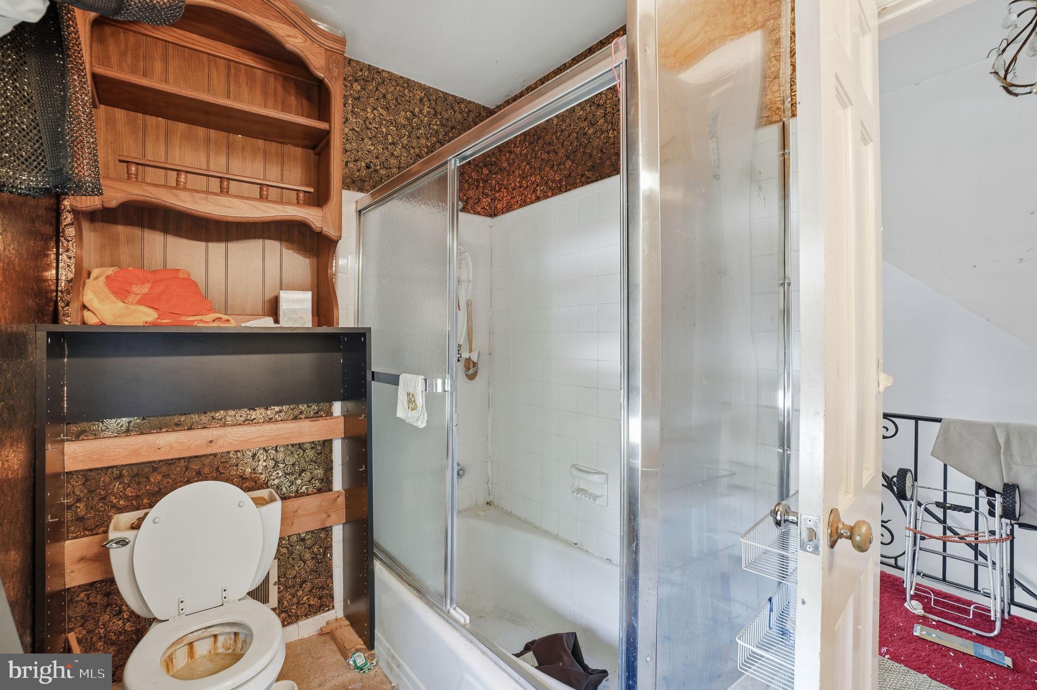 1430 Foxhall Road Northwest Washington, DC 20007 - Photo 24 of 53 a bathroom with a sink and a mirror