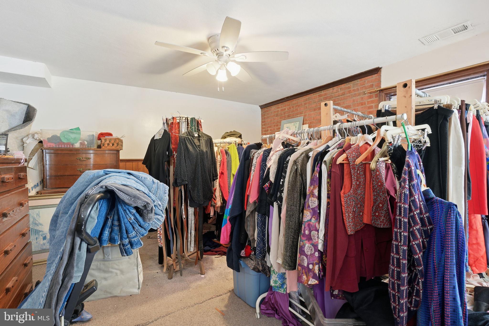 1430 Foxhall Road Northwest Washington, DC 20007 - Photo 25 of 53 a view of walk in closet with clothes