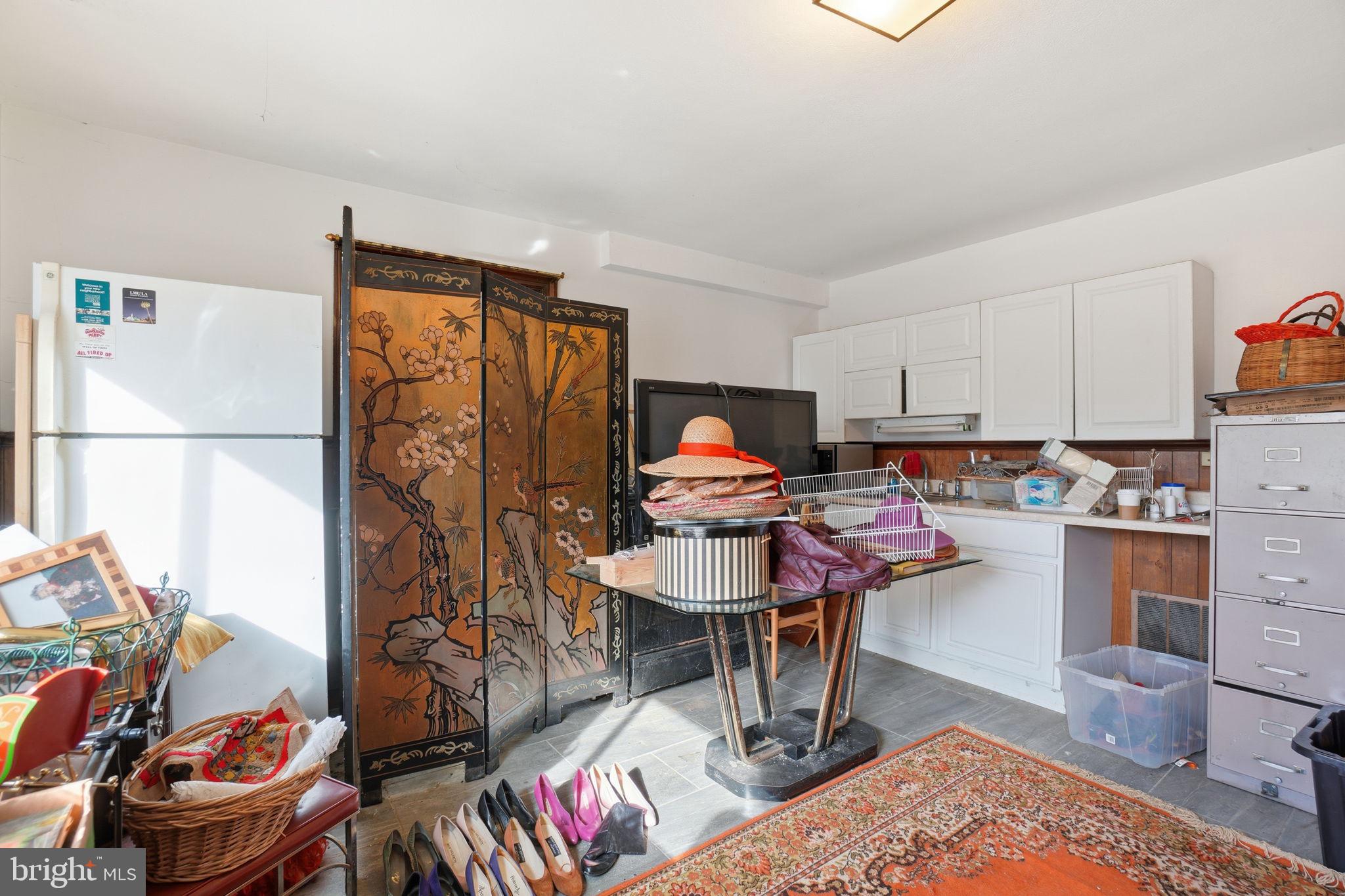 1430 Foxhall Road Northwest Washington, DC 20007 - Photo 26 of 53 a workspace with furniture and a kitchen view