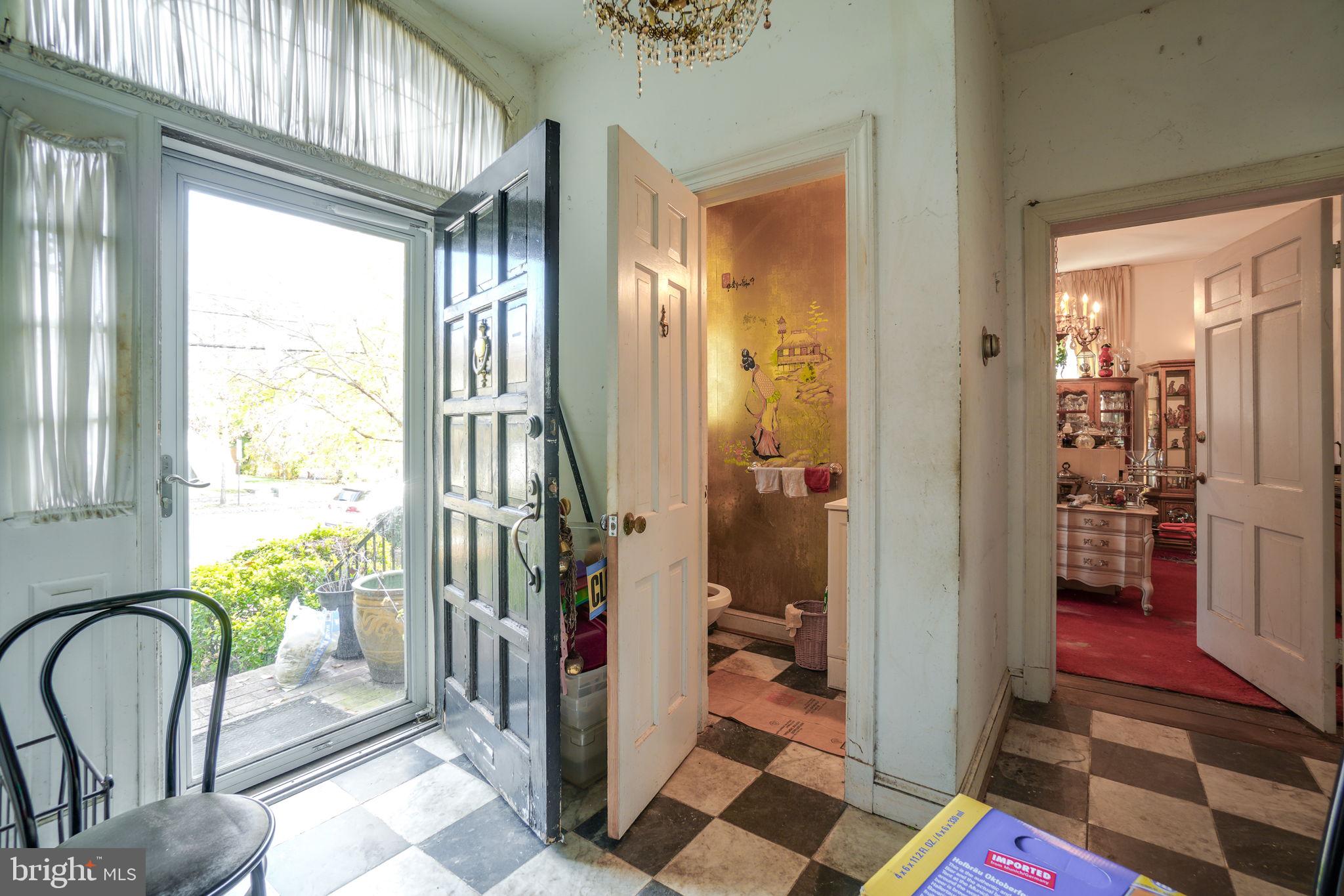 1430 Foxhall Road Northwest Washington, DC 20007 - Photo 3 of 53 a bathroom with a bathtub and a shower