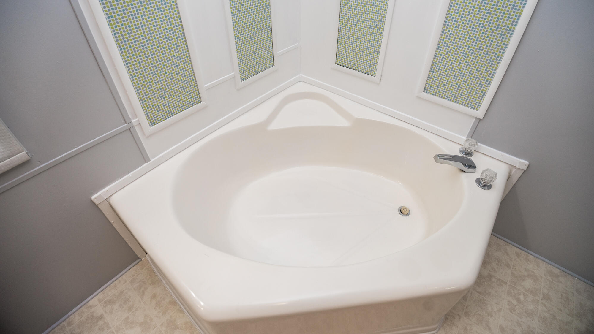 125 Red Eye Road DeFuniak Springs, FL 32433 - Photo 17 of 50 a white bath tub sitting in a bathroom