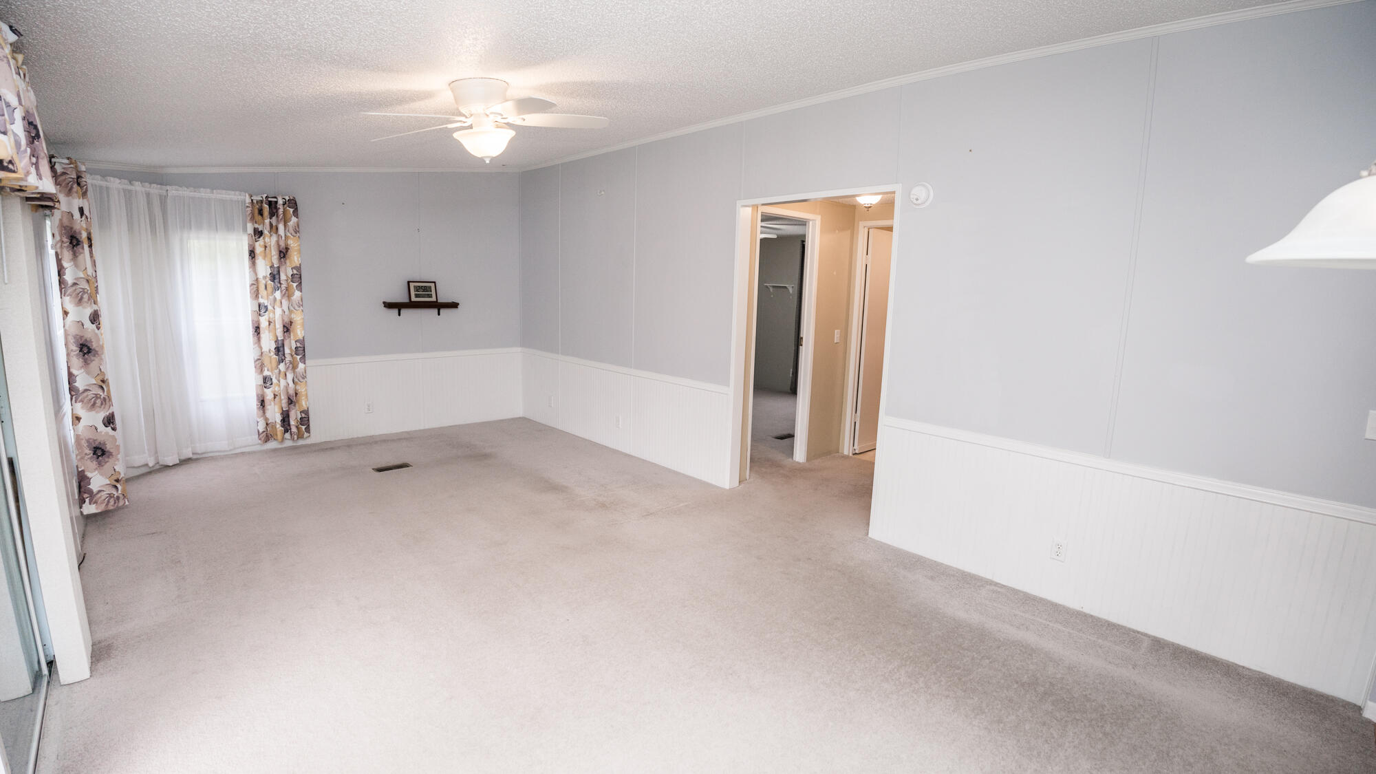 125 Red Eye Road DeFuniak Springs, FL 32433 - Photo 20 of 50 a view of a big room with closet and windows