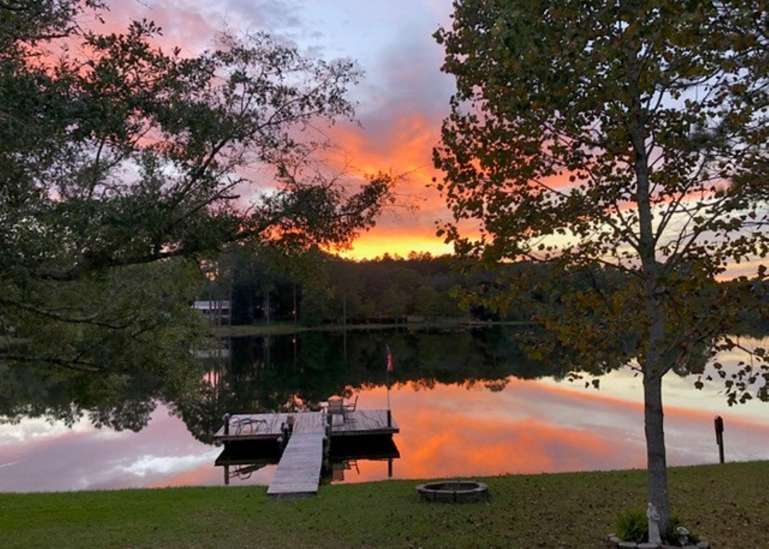 125 Red Eye Road DeFuniak Springs, FL 32433 - Photo 2 of 50 a lake view with sitting space and garden