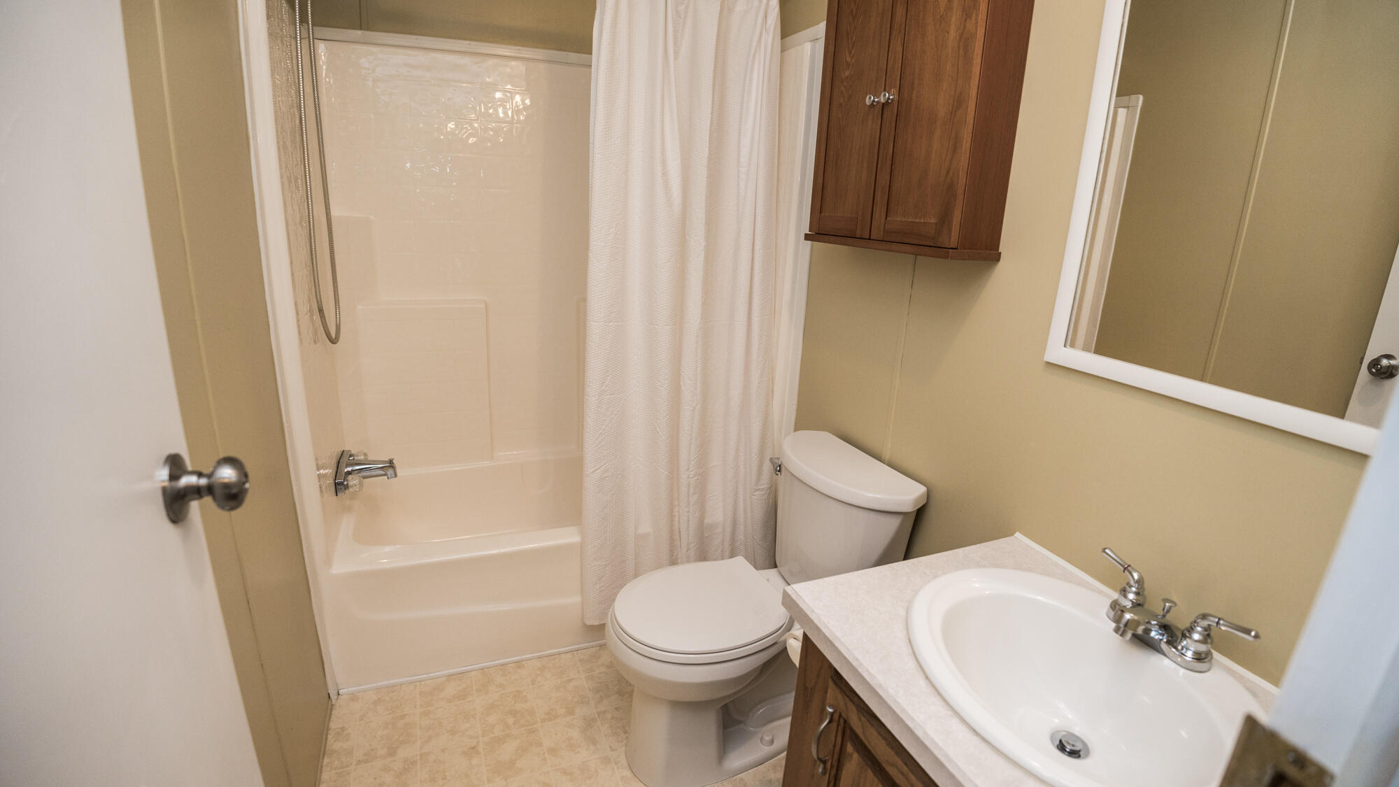 125 Red Eye Road DeFuniak Springs, FL 32433 - Photo 23 of 50 a bathroom with a sink and a toilet