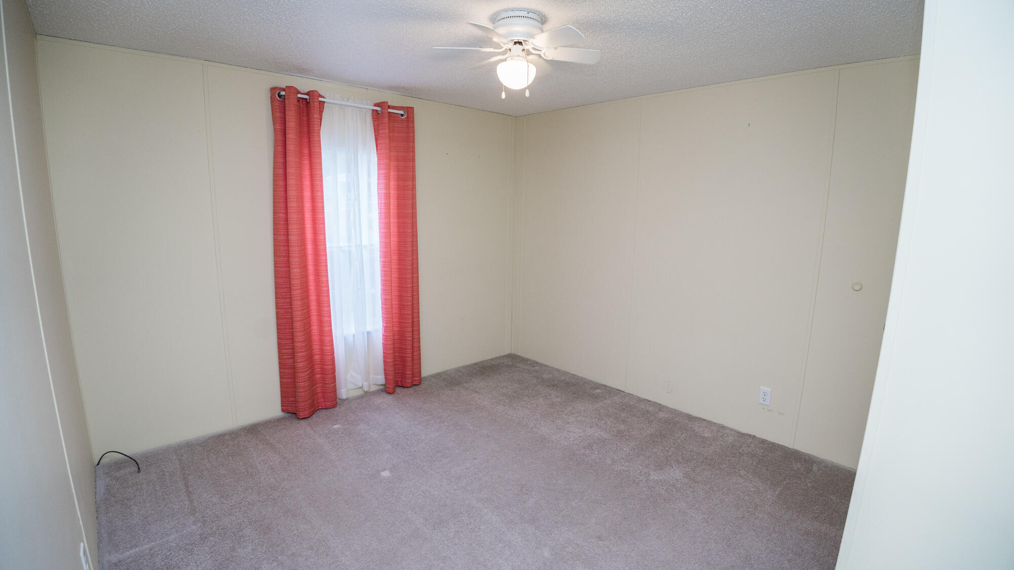 125 Red Eye Road DeFuniak Springs, FL 32433 - Photo 24 of 50 a view of a room with a projector and fan