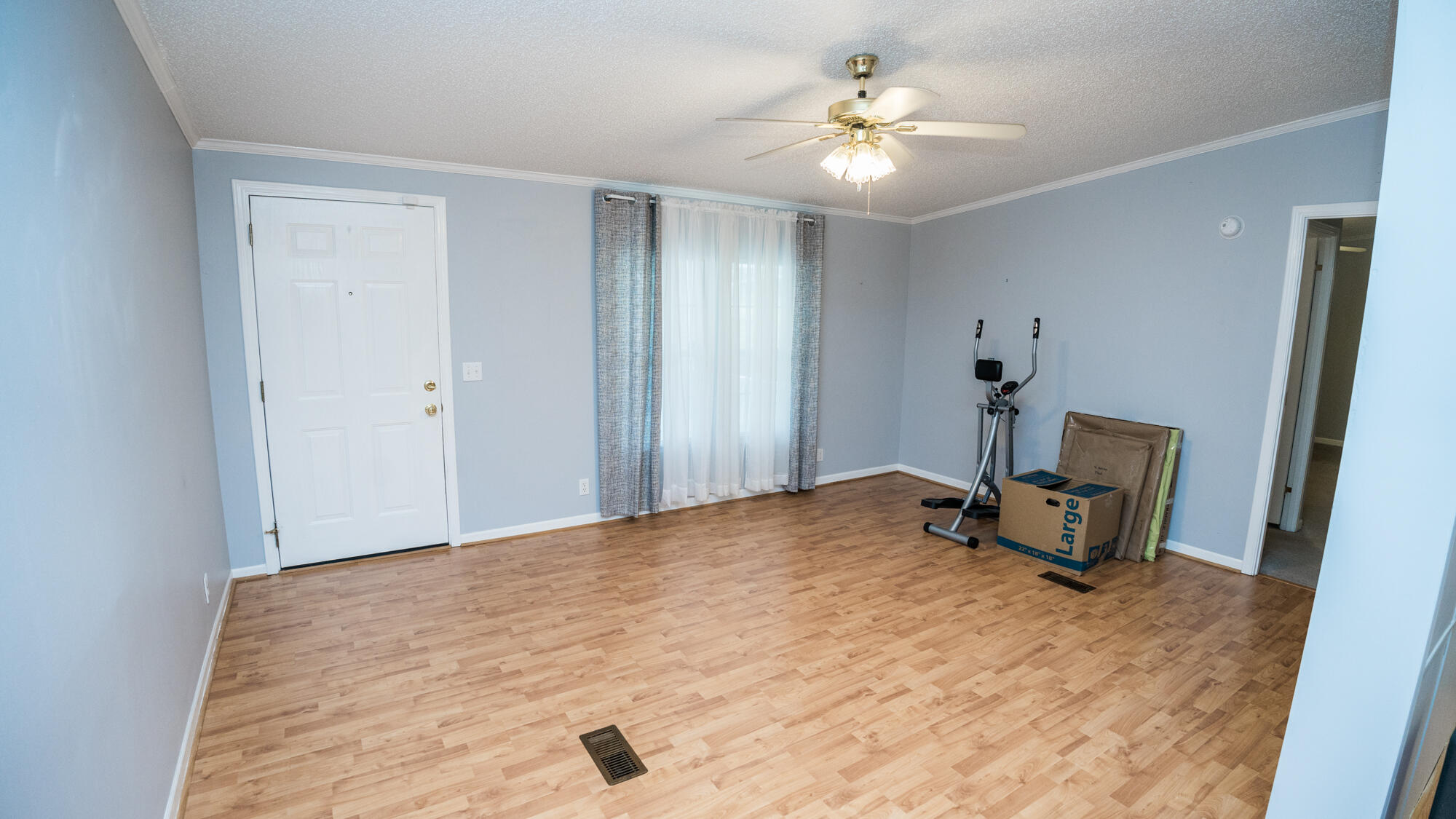 125 Red Eye Road DeFuniak Springs, FL 32433 - Photo 6 of 50 a bedroom with a bed and a chandelier