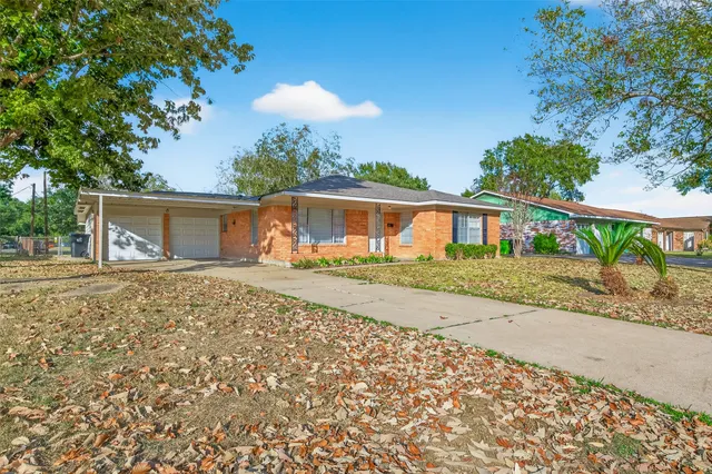 front view of a house with a patio