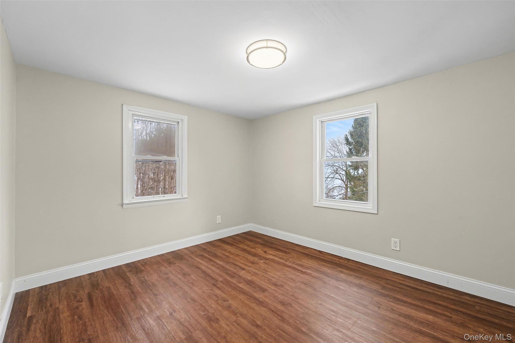 108 Pine Hill Road Chester, NY 10918 - Photo 21 of 37 wooden floor in an empty room with a window